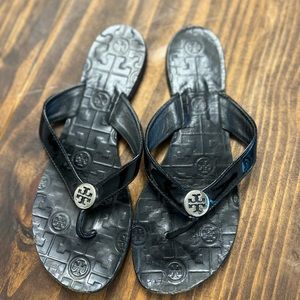 Tory Burch flip flops. Fits better if you have wider feet